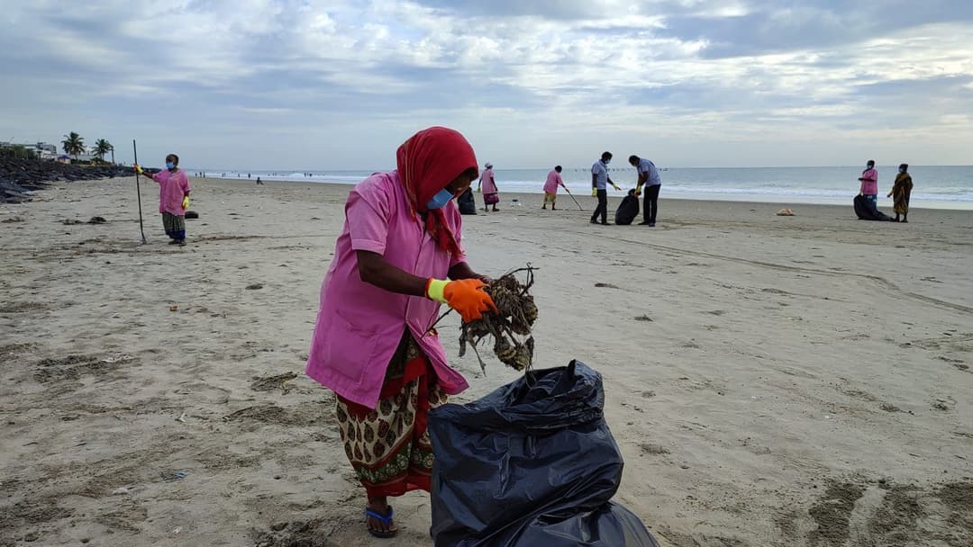 Waste Worker at the beach